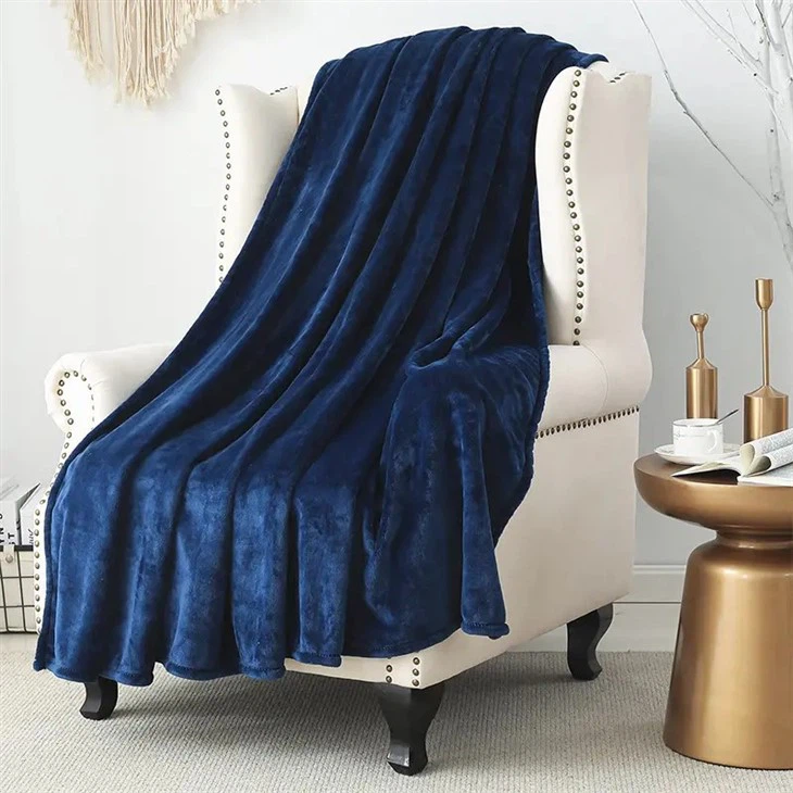 flannel blanket on the groud